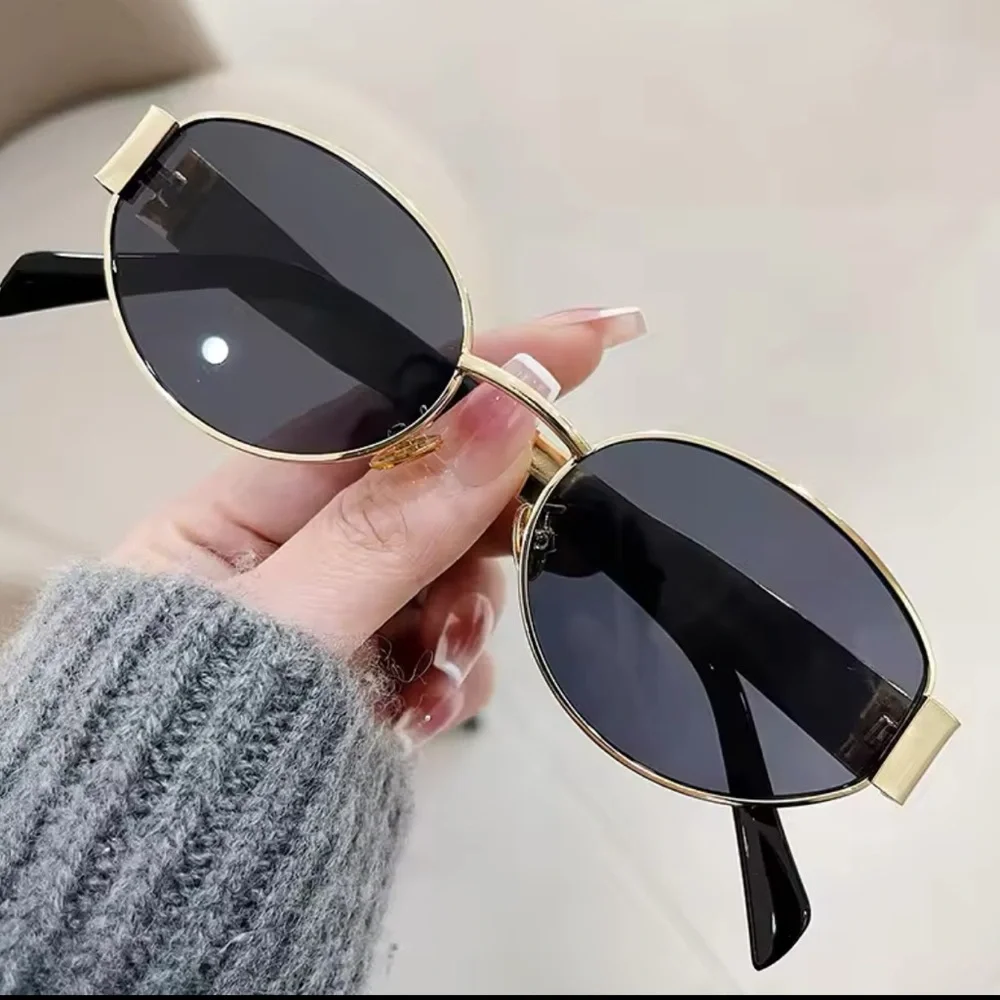 Chic Black and Gold Oval Sunglasses